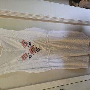 White Sleeveless Top with Embroidered Design
